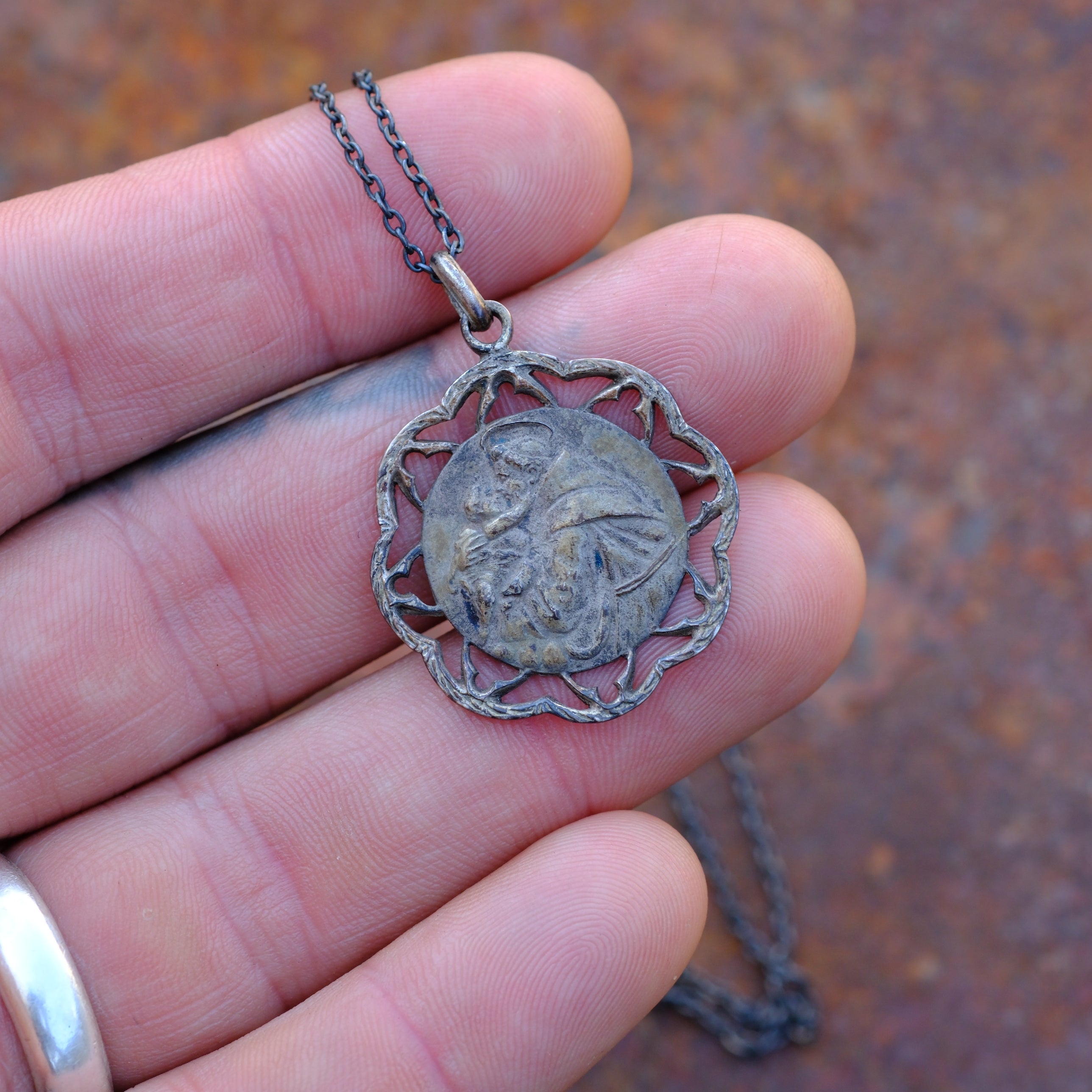 Vintage sterling Silver Saint Necklace
