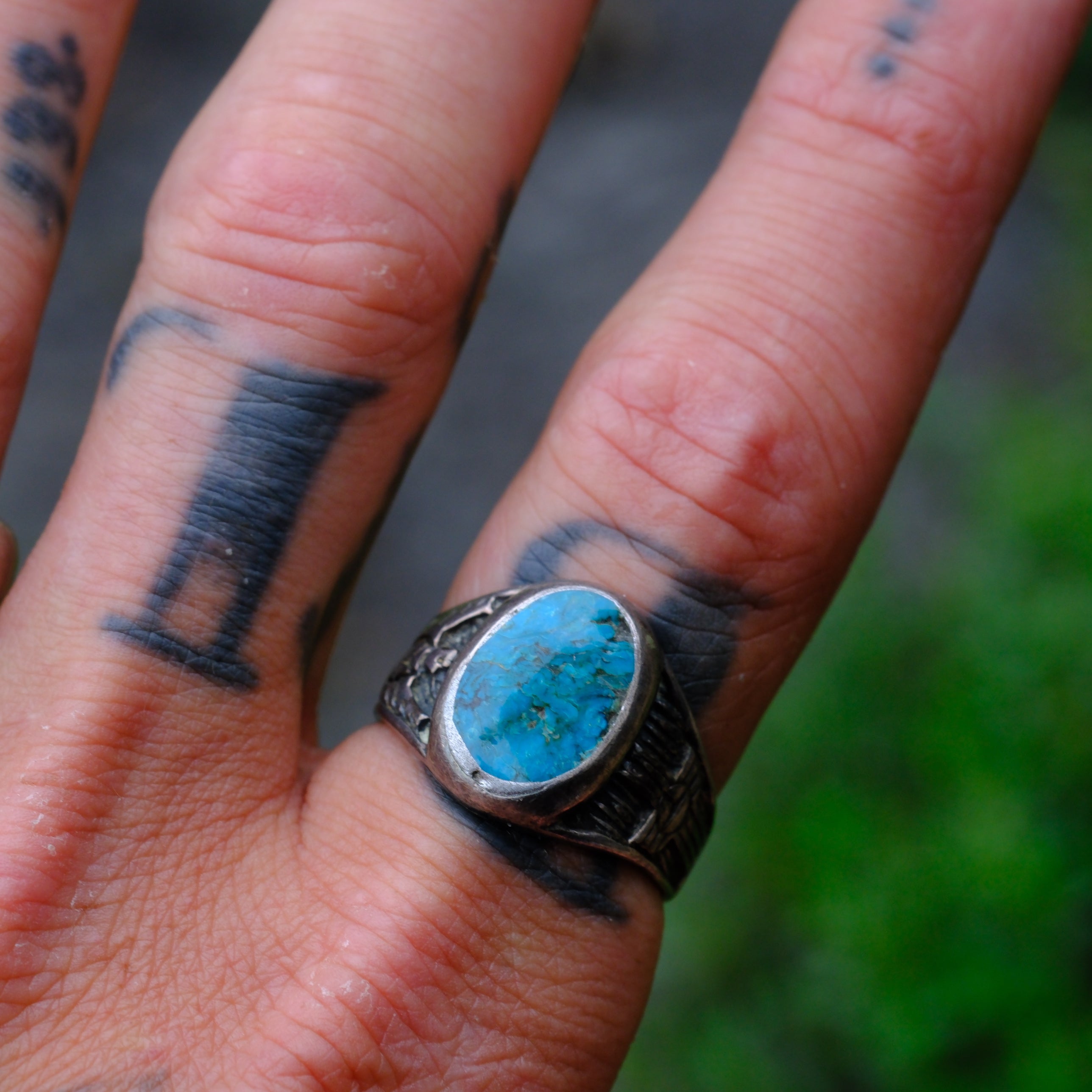 Vintage Sterling Turquoise Thunderbird and Zia Ring 9.75